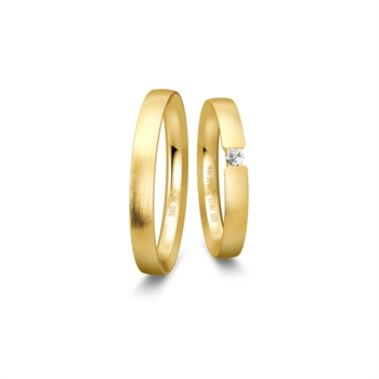 Breuning vielsesringe i 8-14 kt guld med mat overflade og 0,05 ct brillant i dameringen.