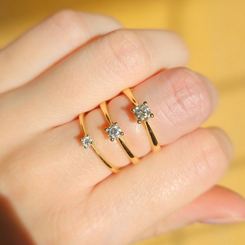 The One Diamantring i 14 kt. guld med i alt 0,07 - 0,38 carat