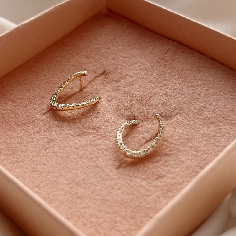 Dazzling 14 kt. guld øreringe 0,24 H-W/SI b