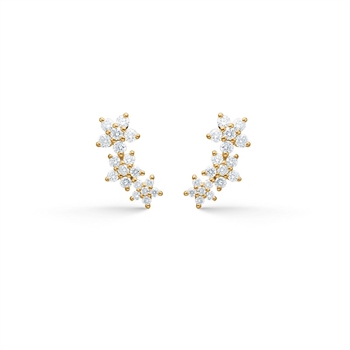 Céleste øreringene i 14 kt guld er et markant statement-smykke fra Mads Z