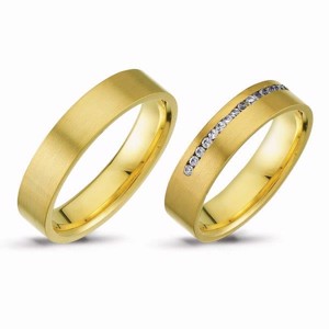 Nuran - Vielsesringe i 14 kt guld m i alt 0,16 ct.