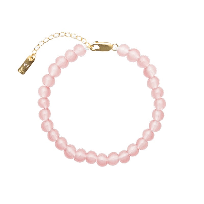 Det smukke Candy Coral Blossom armbånd fra House of Vincent