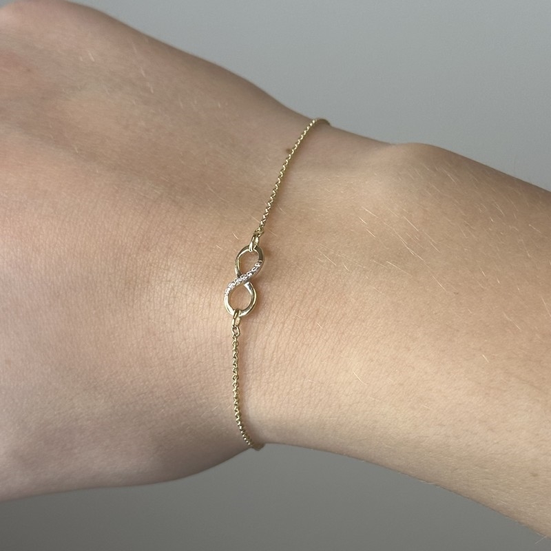8kt guld armbånd med evighedstegn og zirkonia