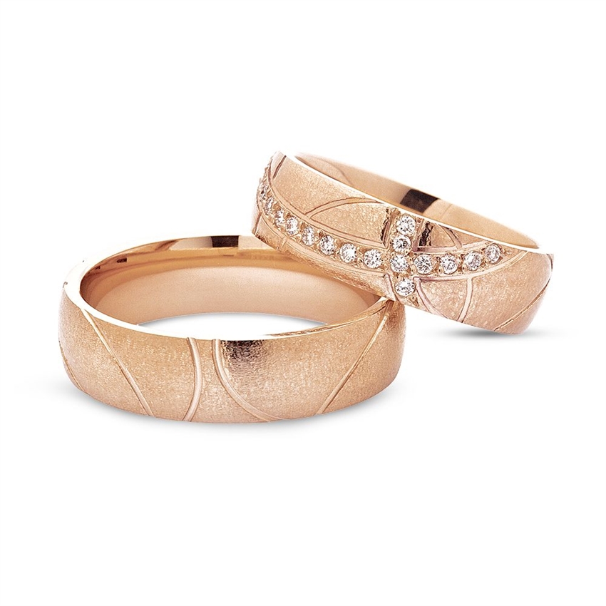 Nuran - Vielsesringe i 14 kt Rosaguld m 0,19 ct brillanter i dameringen